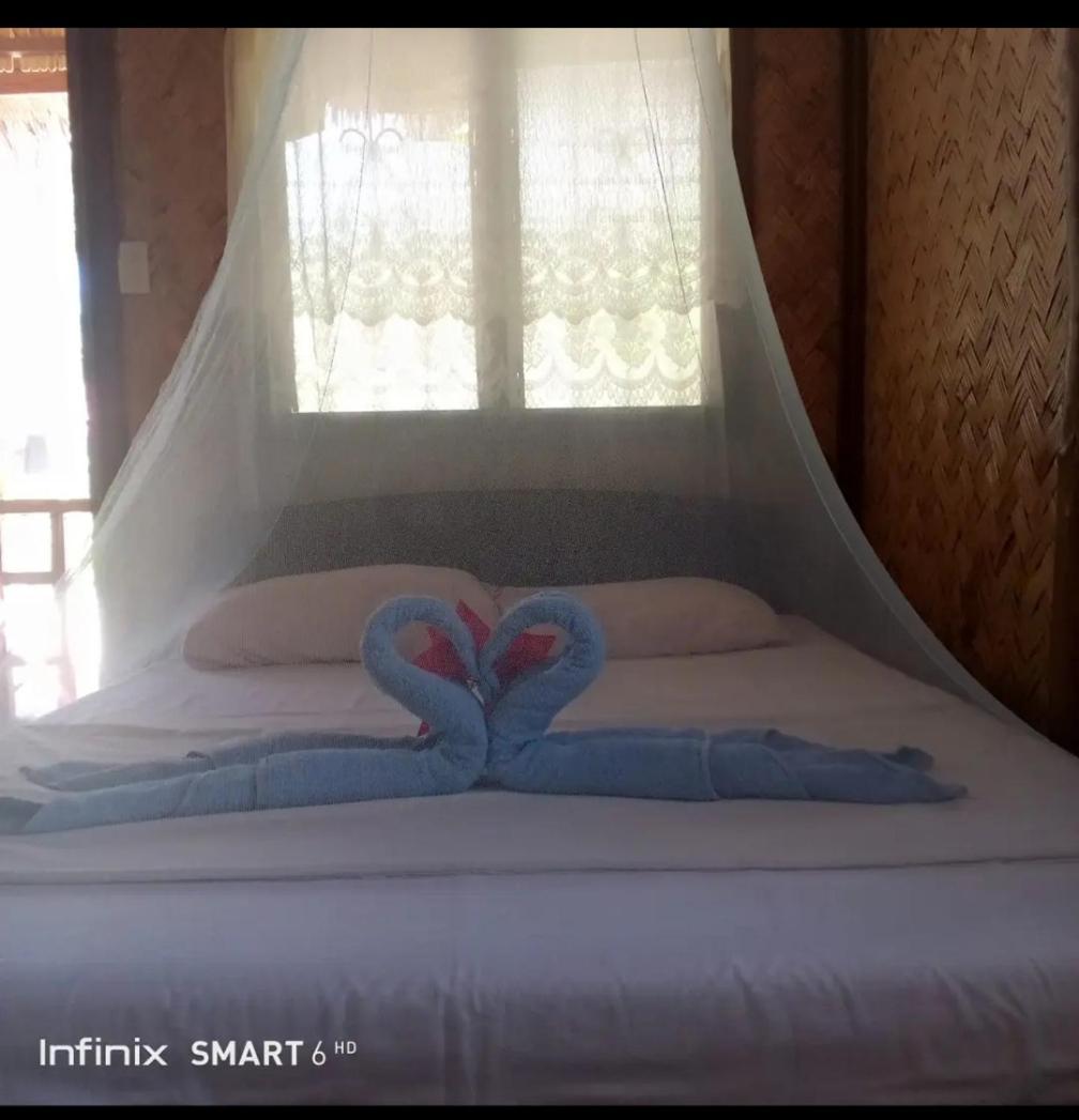 Akoya Beach Park And Cottages Locaroc Ruang foto